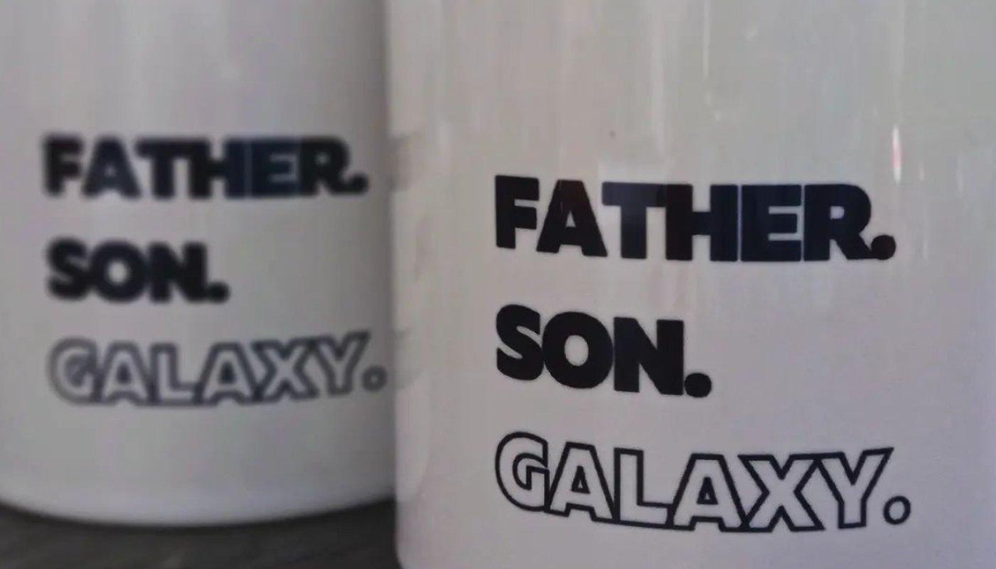 father son galaxy printed merch mugs